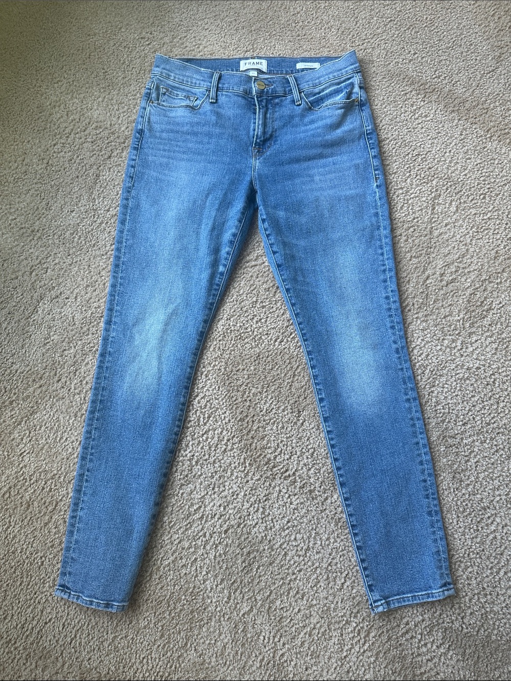 Frame Denim Mid Wash Skinny Jeans in Blue
